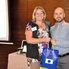 Julie Franklin, All Leisure Holidays presents Alex Garcia, Steamond Travel with an All Leisure gift bag.