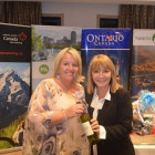 Winner of the Bingo ? Michelle Harriman from Hanson Travel with Jeanette Ratcliffe ( Travel Bulletin )