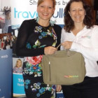 Travel Counsellor?s Cornel Schalkwyk wins a Botswana briefcase from Dawn Wilson, Botswana Tourism