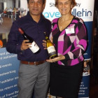 Khaled Shiraj from Sam Travel wins 2 bottles of wine from 2By2 Holidays Claire Farley