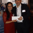 Sophie Sheth from Travel Counsellors winning a ?100 Love2Shop voucher from Lee Barker, One & Only Resorts